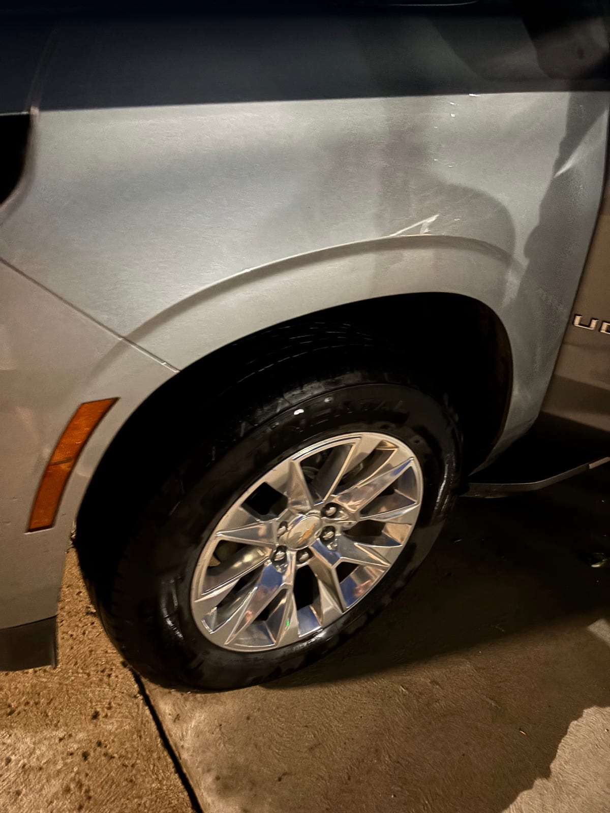 Cleaned alloy wheel and dressed tire on a Chevrolet Tahoe